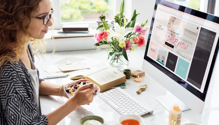 Woman shopping online in her house