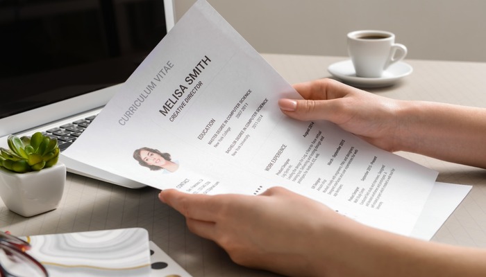 Person reading a resume