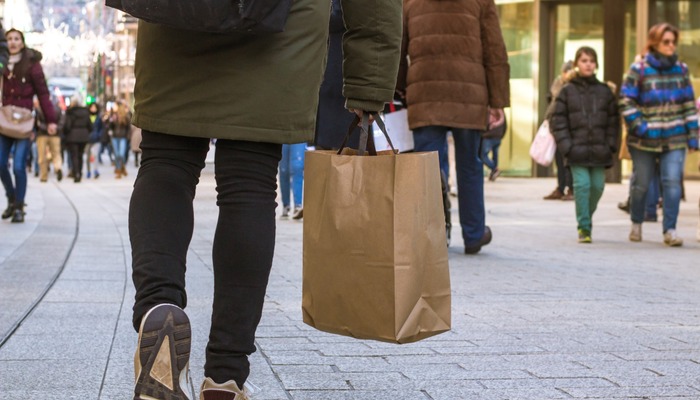 People shopping in a street crowded for Christmas