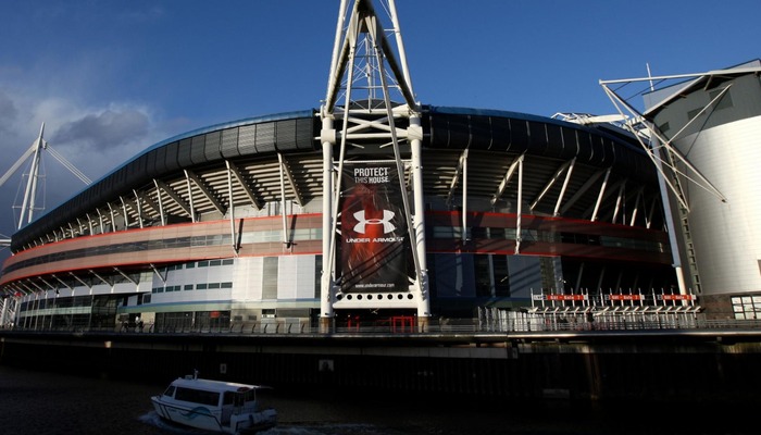 Exterior of the Principality Stadium in Cardiff featuring Under Armour marketing banners